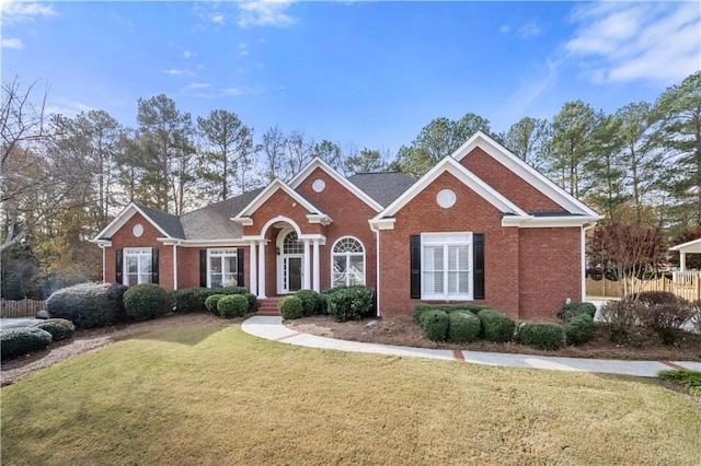 view of front of property with a front lawn