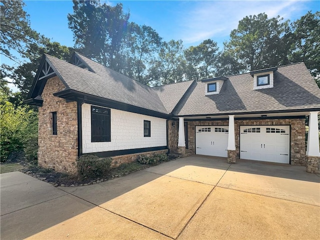 craftsman-style house featuring a garage