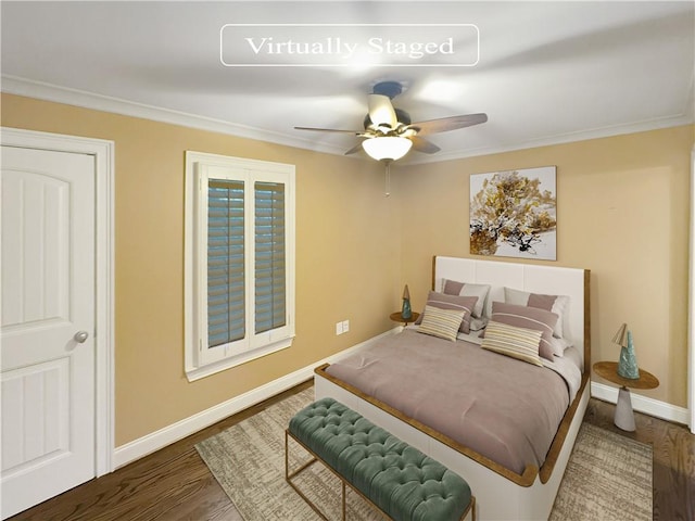 bedroom with ceiling fan, dark wood-type flooring, and crown molding