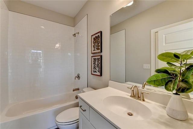 full bathroom featuring vanity, shower / bathtub combination, and toilet