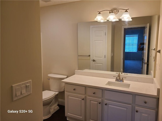 303 Tara Commons Cir, Loganville, GA 30052 - bathroom with vanity and a chandelier