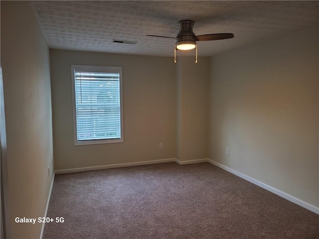 303 Tara Commons Cir, Loganville, GA 30052 - carpeted empty room with ceiling fan and baseboards
