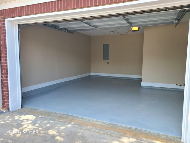 303 Tara Commons Cir, Loganville, GA 30052 - garage with electric panel and baseboards