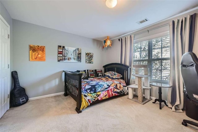 bedroom with light carpet