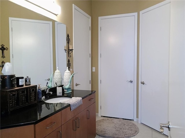 bathroom featuring vanity and tile patterned flooring