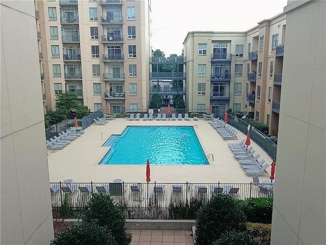 711 Cosmopolitan Dr NE Unit 123, Atlanta, GA 30324 - community pool featuring a patio area