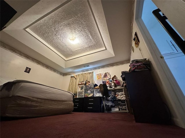 5546 Wellborn Creek Dr, Lithonia, GA 30058 - carpeted bedroom with a tray ceiling