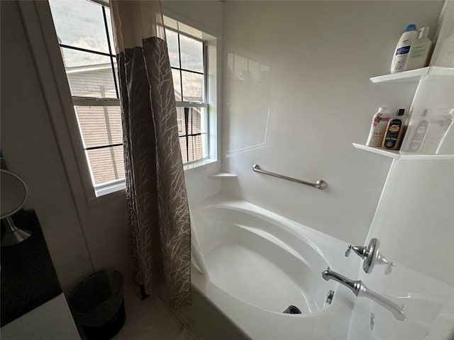 5546 Wellborn Creek Dr, Lithonia, GA 30058 - full bathroom featuring toilet and shower / tub combo with curtain
