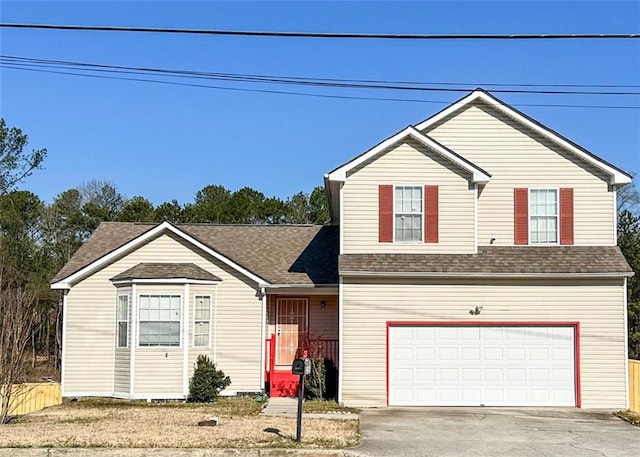 5546 Wellborn Creek Dr, Lithonia, GA 30058 - traditional-style home with an attached garage, concrete driveway, and a shingled roof