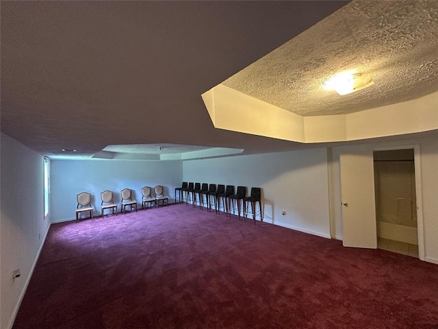 5546 Wellborn Creek Dr, Lithonia, GA 30058 - bonus room featuring carpet floors, a textured ceiling, and baseboards