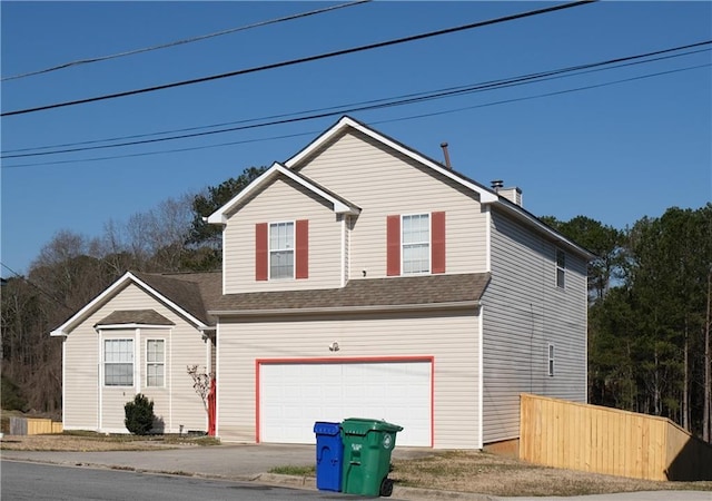 5546 Wellborn Creek Dr, Lithonia, GA 30058 - traditional home featuring driveway, an attached garage, and roof with shingles