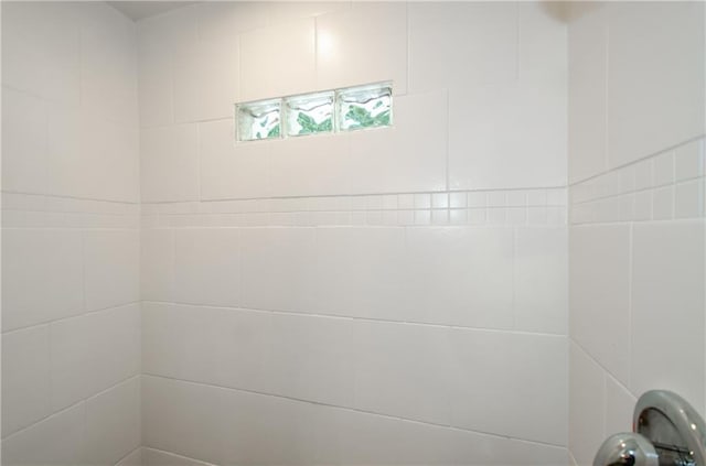 room details with a tile shower