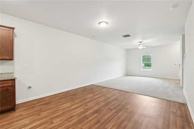 4001 Avalon Rd SW, Atlanta, GA 30331 - empty room featuring a ceiling fan, baseboards, visible vents, and light wood-style flooring