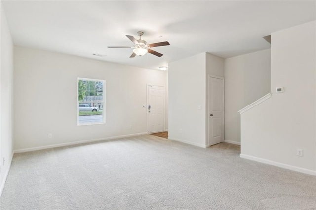 4001 Avalon Rd SW, Atlanta, GA 30331 - spare room featuring ceiling fan, light carpet, and baseboards