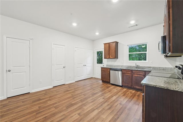 4001 Avalon Rd SW, Atlanta, GA 30331 - kitchen with visible vents, appliances with stainless steel finishes, light wood-type flooring, a sink, and recessed lighting