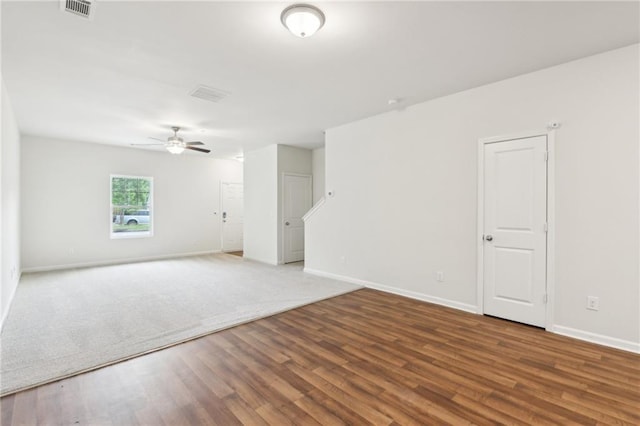 4001 Avalon Rd SW, Atlanta, GA 30331 - spare room with baseboards, ceiling fan, wood finished floors, and visible vents