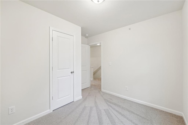 4001 Avalon Rd SW, Atlanta, GA 30331 - unfurnished bedroom featuring baseboards and carpet