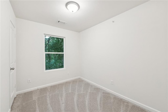 4001 Avalon Rd SW, Atlanta, GA 30331 - spare room featuring baseboards, carpet flooring, and visible vents