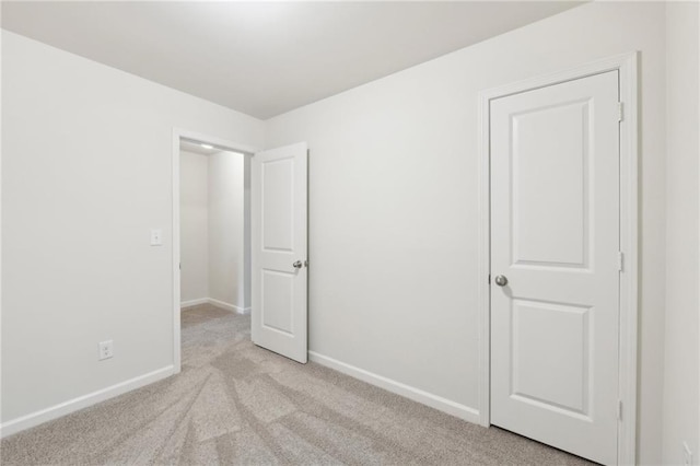4001 Avalon Rd SW, Atlanta, GA 30331 - unfurnished bedroom with light colored carpet and baseboards