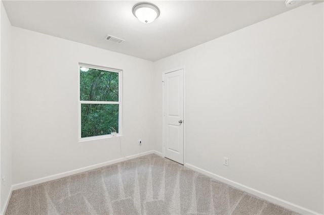 4001 Avalon Rd SW, Atlanta, GA 30331 - unfurnished room with baseboards, carpet floors, and visible vents