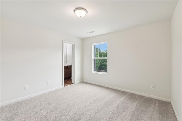4001 Avalon Rd SW, Atlanta, GA 30331 - carpeted spare room featuring baseboards and visible vents