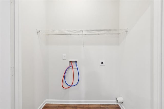 4001 Avalon Rd SW, Atlanta, GA 30331 - laundry room featuring washer hookup, baseboards, electric dryer hookup, and wood finished floors