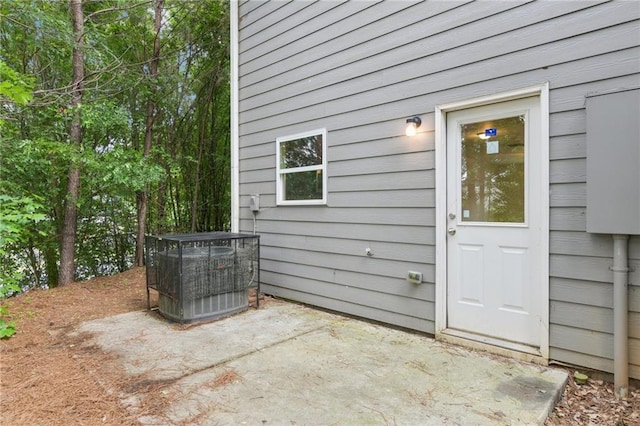 4001 Avalon Rd SW, Atlanta, GA 30331 - doorway to property featuring central AC unit and a patio area