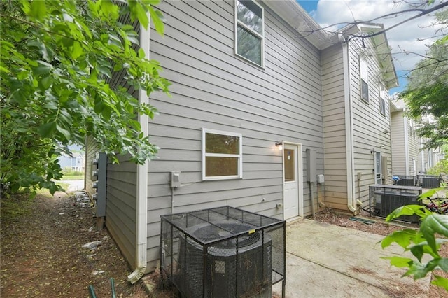 4001 Avalon Rd SW, Atlanta, GA 30331 - back of property featuring a patio and central AC unit