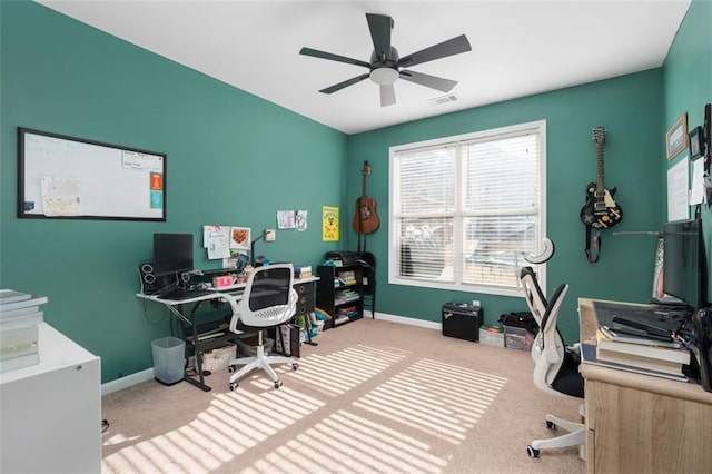 office featuring ceiling fan and light colored carpet