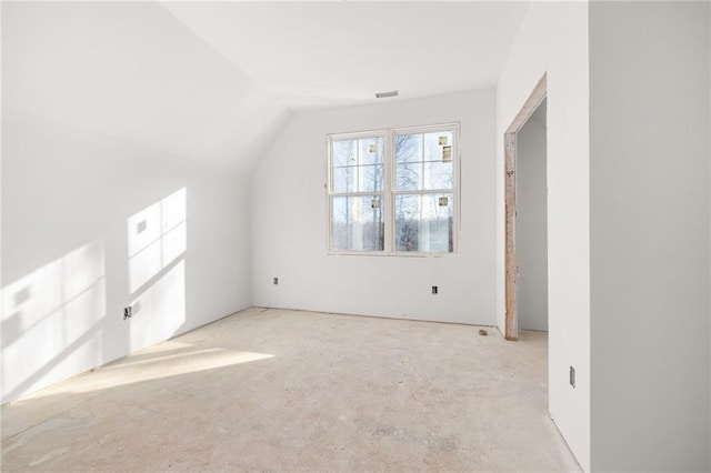 bonus room featuring lofted ceiling