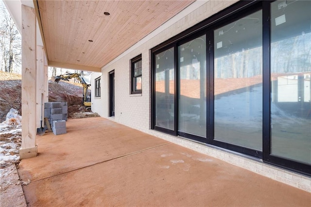 view of snow covered patio