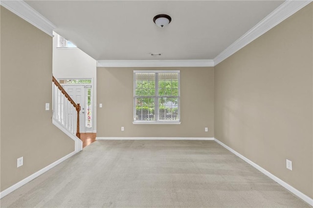 3039 Tuscan Ridge Dr, Snellville, GA 30039 - empty room featuring crown molding, stairway, baseboards, and carpet flooring