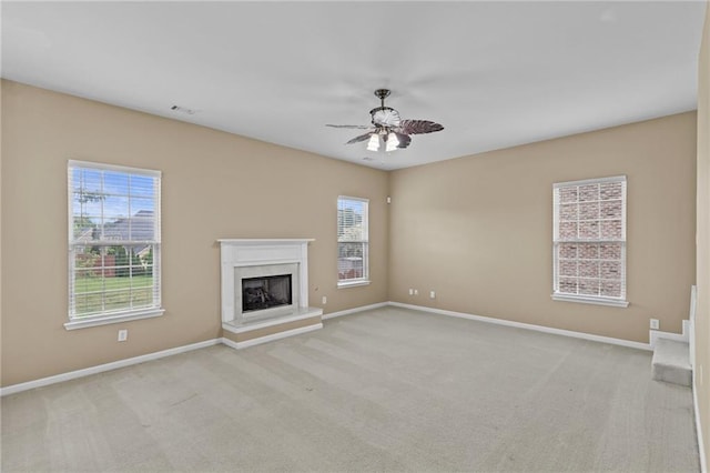 3039 Tuscan Ridge Dr, Snellville, GA 30039 - unfurnished living room featuring ceiling fan, a premium fireplace, and carpet flooring