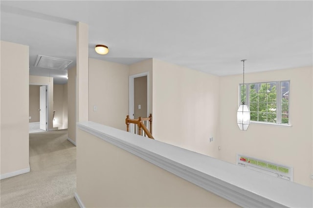 3039 Tuscan Ridge Dr, Snellville, GA 30039 - corridor with attic access, light carpet, baseboards, and an upstairs landing