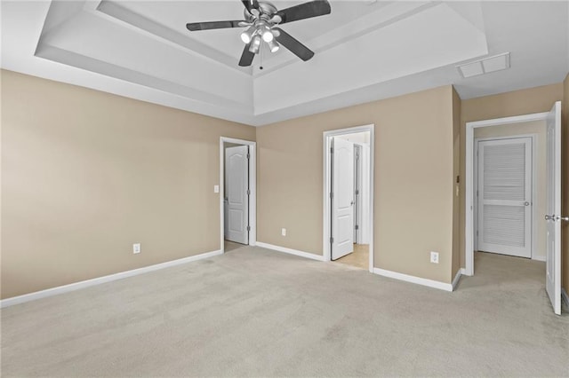 3039 Tuscan Ridge Dr, Snellville, GA 30039 - unfurnished bedroom featuring a raised ceiling, carpet, baseboards, and a ceiling fan
