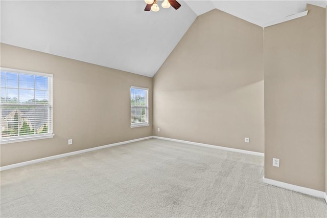3039 Tuscan Ridge Dr, Snellville, GA 30039 - carpeted spare room featuring vaulted ceiling, a ceiling fan, healthy amount of natural light, and baseboards