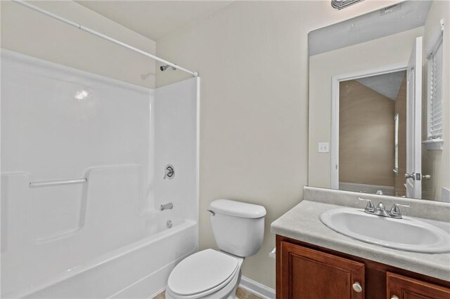 3039 Tuscan Ridge Dr, Snellville, GA 30039 - full bathroom featuring vanity, toilet, baseboards, and  shower combination