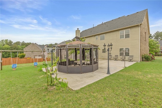 3039 Tuscan Ridge Dr, Snellville, GA 30039 - back of property with a gazebo and a patio area