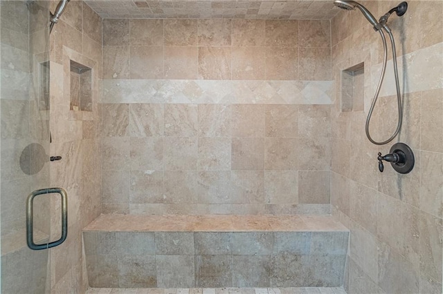 bathroom with a stall shower