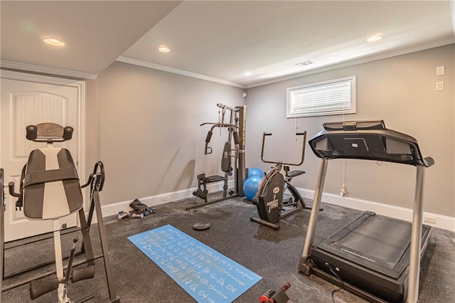 exercise area with baseboards, recessed lighting, and crown molding