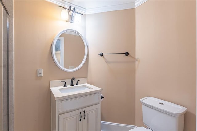 full bathroom featuring ornamental molding, toilet, and vanity