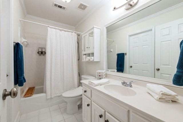 bathroom featuring toilet, vanity, visible vents, and crown molding