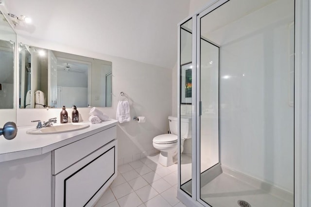 full bath with toilet, a stall shower, tile patterned flooring, and vanity