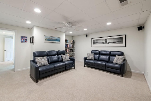 carpeted living area with recessed lighting, visible vents, and baseboards