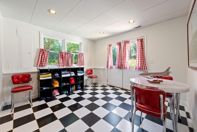 playroom featuring recessed lighting, plenty of natural light, visible vents, and tile patterned floors