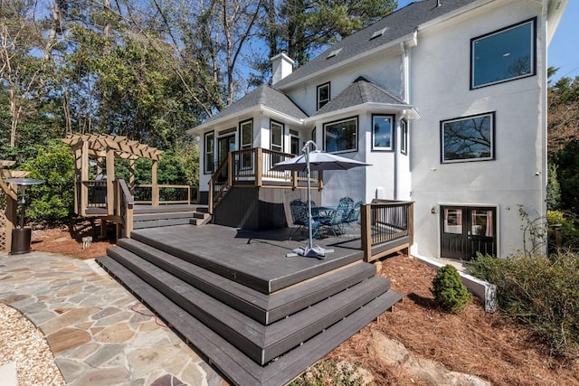 wooden deck with a pergola