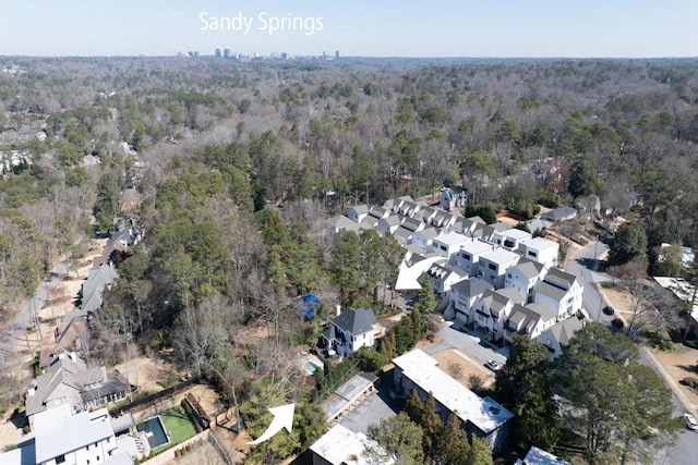 aerial view featuring a residential view and a forest view