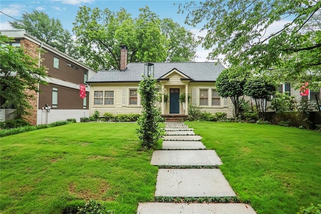 728 Antone St NW, Atlanta, GA 30318 - ranch-style home featuring a chimney and a front yard