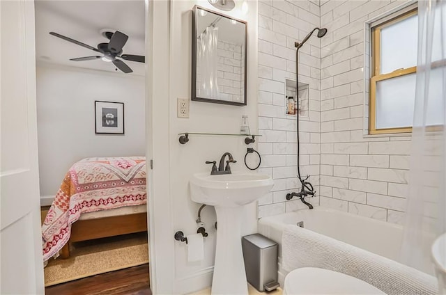 728 Antone St NW, Atlanta, GA 30318 - ensuite bathroom featuring shower / bath combination with curtain, toilet, and ceiling fan