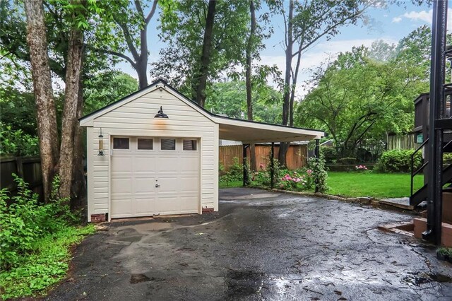 728 Antone St NW, Atlanta, GA 30318 - garage featuring driveway and a garage